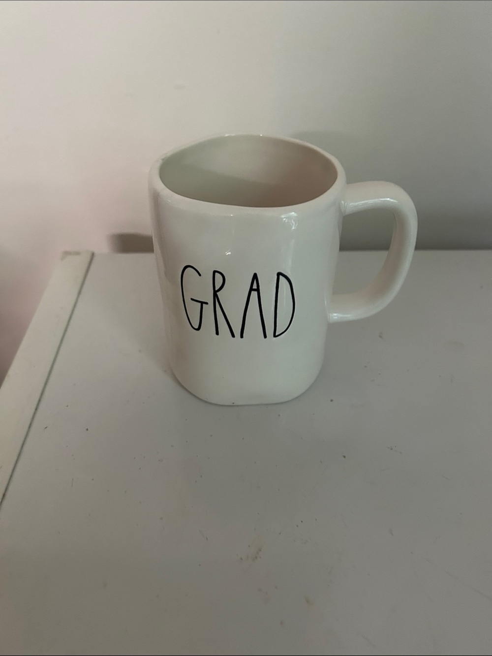 Rae Dunn White Ceramic Mug with GRAD Lettering